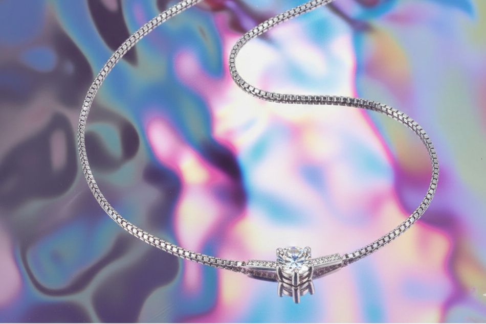 Silver necklace with a pendant on a colorful, abstract background